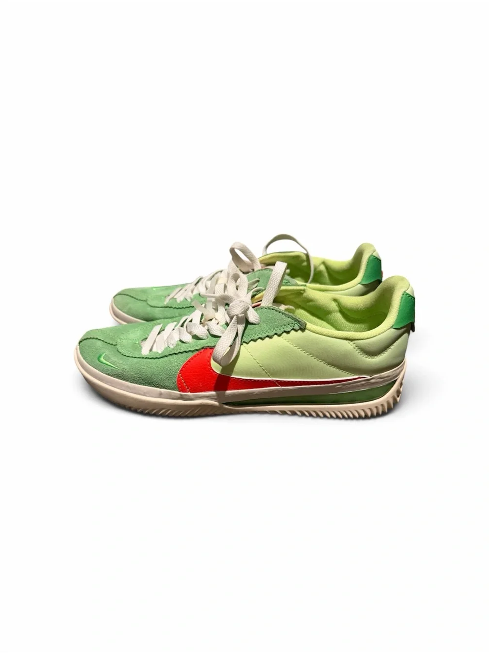 Nike Green Low-Top Athletic Shoes with Red Swoosh